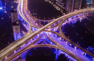 Illuminated crossroads at night