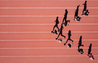 Runners on a running track