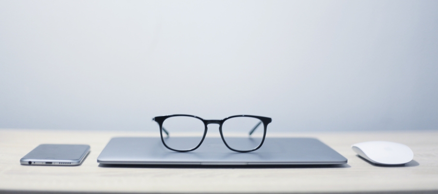 Phone, laptop and glasses