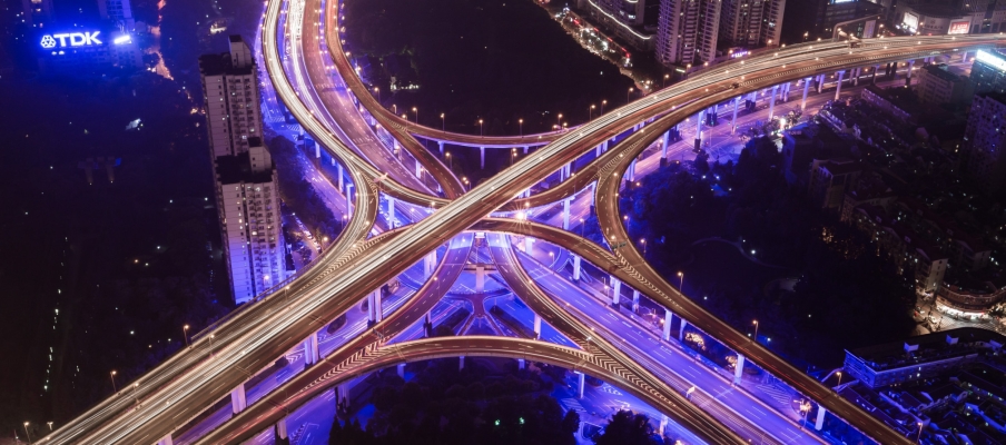 Illuminated crossroads at night